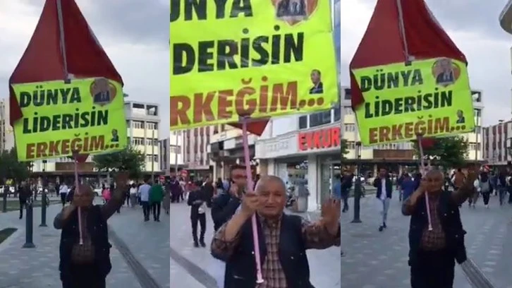 “Dünya liderisin erkeğim…” pankartıyla şehri dolaştı
