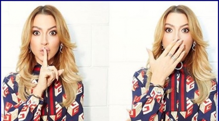 Hadise saç boyası için Belçika'ya gidiyor