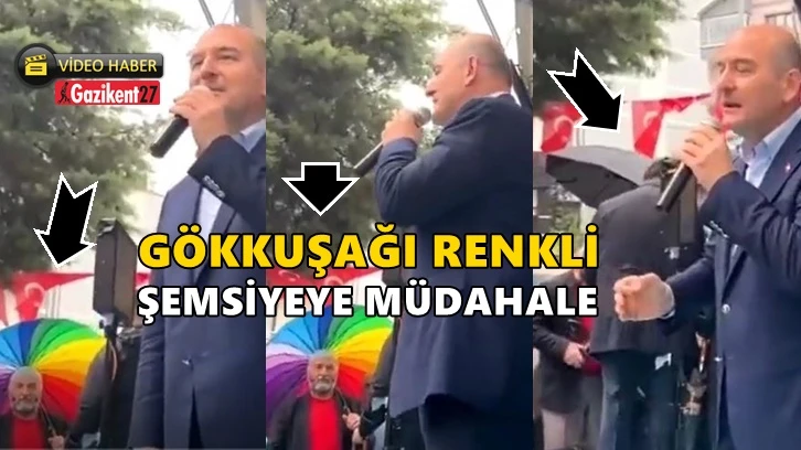 Soylu, konuşurken gökkuşağı renkli şemsiye açılınca...