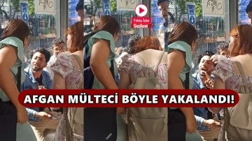 Afgan m&uuml;lteci kadının fotoğraflarını gizlice &ccedil;ekti!