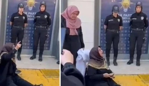 AKP binası önünde başörtülü bir kadın ağlayarak;'Bunu niye yapıyorsunuz bize.Biz terörist miyiz?