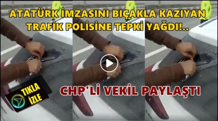 Atatürk imzasını bıçakla kazıyan polis!