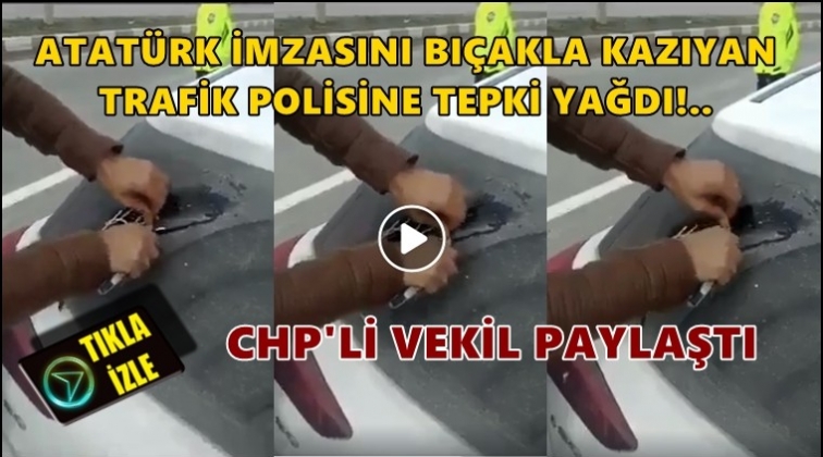 Atat&uuml;rk imzasını bı&ccedil;akla kazıyan polis!