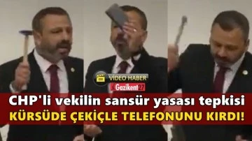 CHP'li vekil Meclis'te &ccedil;eki&ccedil;le telefonunu kırdı!