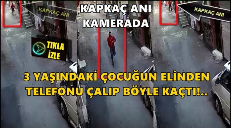 &Ccedil;ocuğun elinden telefonu kaptı ka&ccedil;tı!..