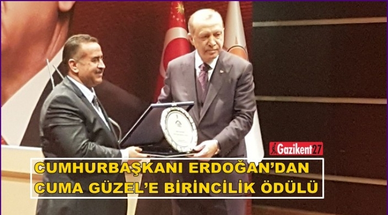 Cuma Güzel  birincilik ödülünü Erdoğan’ın elinden aldı