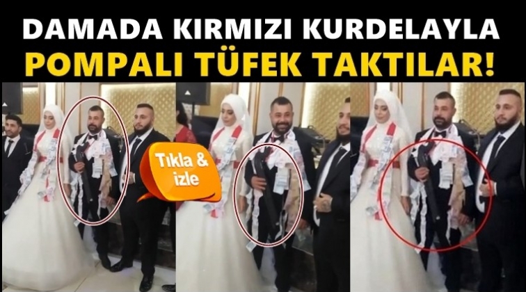 Damada kırmızı kurdeleli pompalı t&uuml;fek taktılar!
