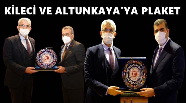 Kileci ve Altunkaya&rsquo;ya &uuml;st&uuml;n hizmet plaketi