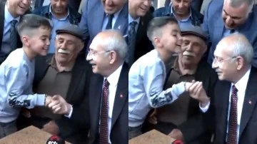 Kılı&ccedil;aroğlu, elini &ouml;pmek isteyen &ccedil;ocuğun elini &ouml;pt&uuml;...