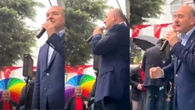 Soylu, konuşurken 'gökkuşağı renklerinde şemsiye' açan vatandaşa korumalardan müdahale!